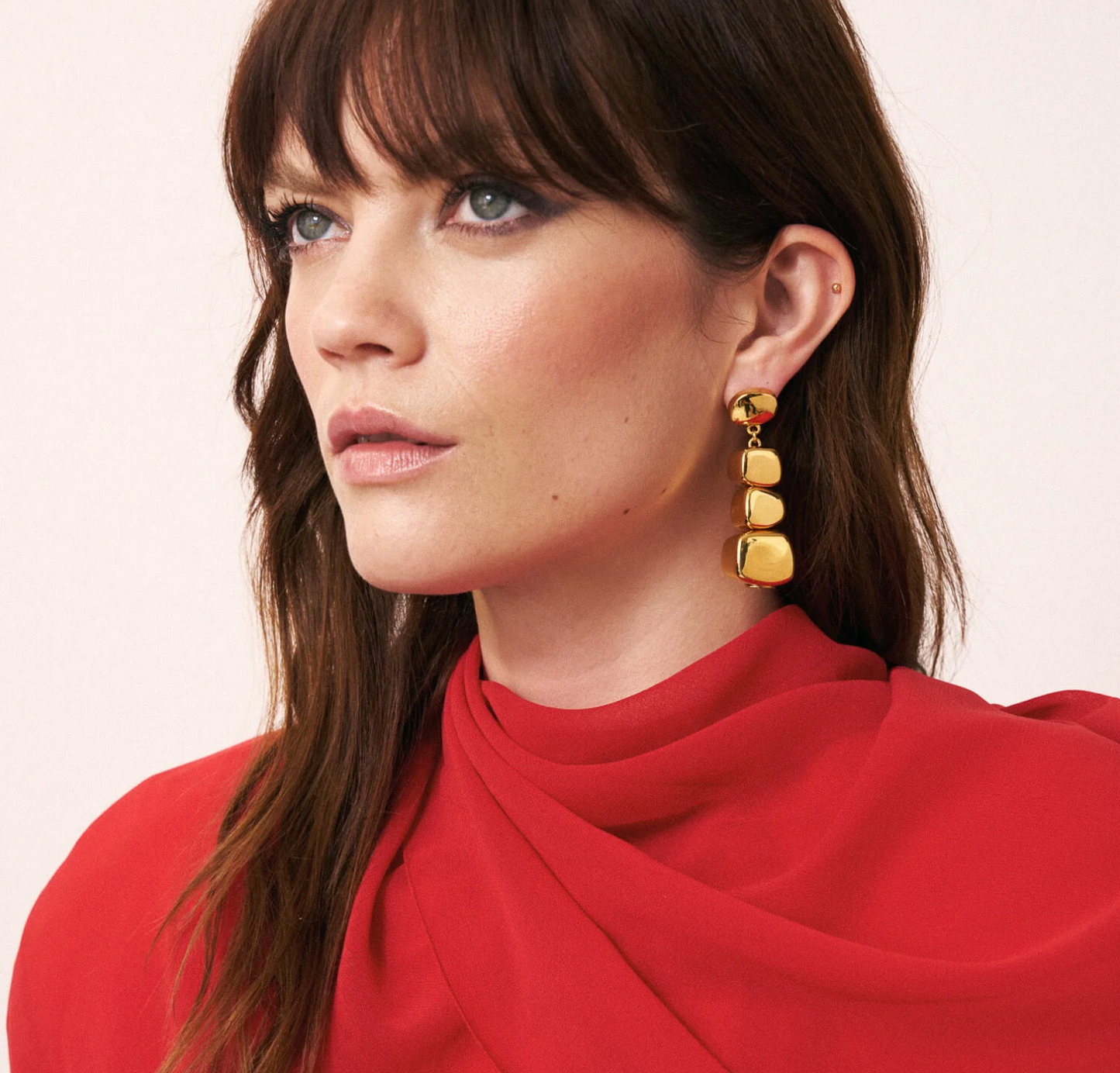 
                  
                    Organic Shaped Earring in Gold
                  
                