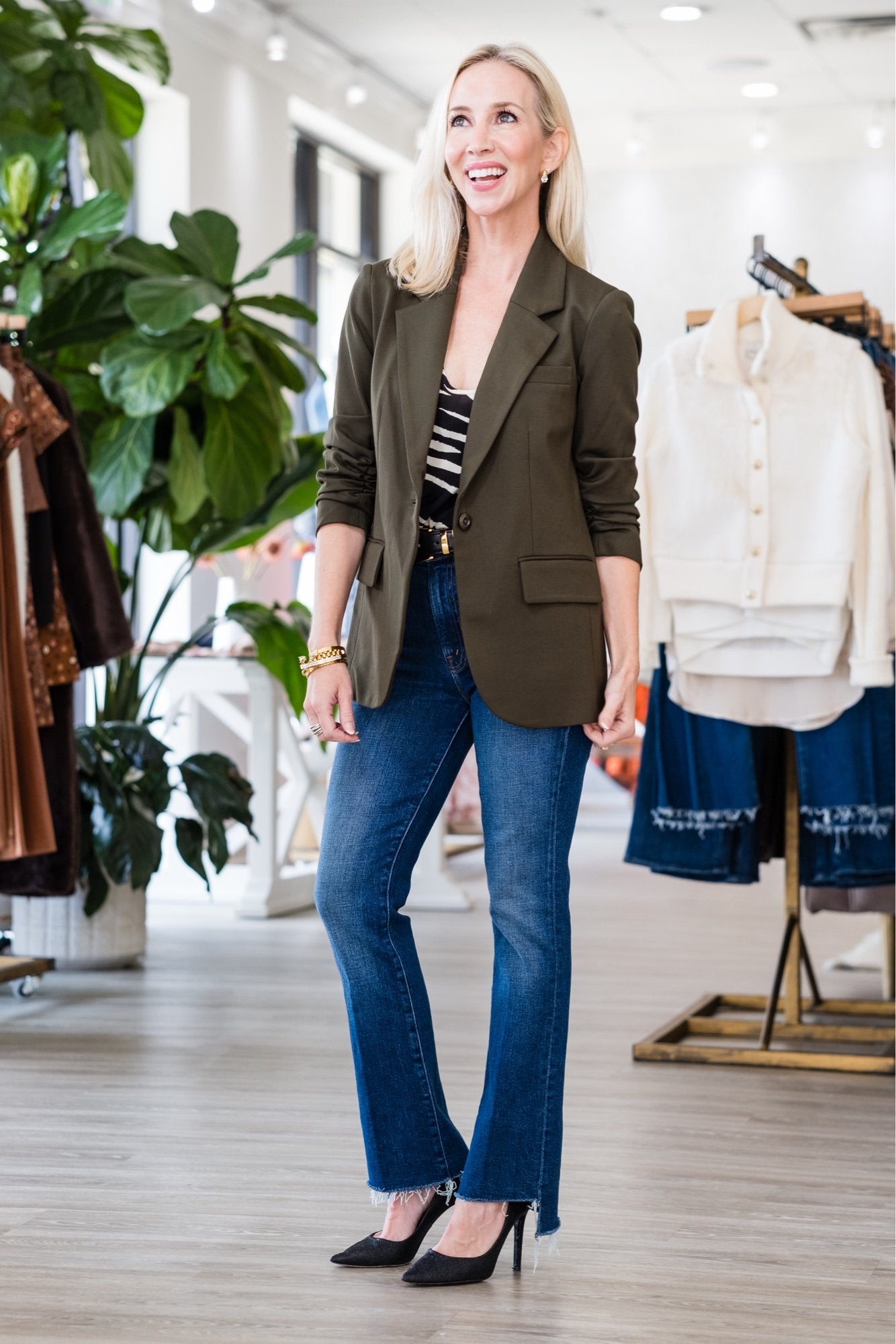 Michele styling a Olive one-button blazer with flare jeans at Lukka Boutique